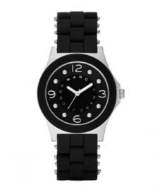 Wear it sporty or wear it stylishly: the Pelly watch by Marc by Marc Jacobs. Black silicone-wrapped stainless steel bracelet and round stainless steel case. Bezel with black silicone ring. Black dial features applied silvertone numerals at twelve, three, six and nine o'clock, dot markers, three silvertone hands and logo ring at inner dial. Quartz movement. Water resistant to 30 meters. Two-year limited warranty. Wear it sporty or wear it stylishly: the Pelly watch by Marc by Marc Jacobs. Black silicone-wrapped stainless steel bracelet and round stainless steel case. Bezel with black silicone ring. Black dial features applied silvertone numerals at twelve, three, six and nine o'clock, dot markers, three silvertone hands and logo ring at inner dial. Quartz movement. Water resistant to 30 meters. Two-year limited warranty.