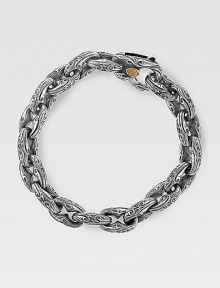 Fine, sterling silver links are styled with handsome Sparta engraving. 18K gold-accent lobster claw clasp About 8½ long Made in USA Fine, sterling silver links are styled with handsome Sparta engraving. 18K gold-accent lobster claw clasp About 8½ long Made in USA