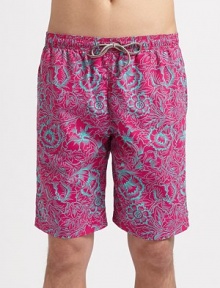 The ultimate tropical style for the beach and beyond in smooth, quick-dry nylon. Elastic drawstring waist Side slash, back zip pockets Mesh lining Inseam, about 12 Nylon Machine wash Imported The ultimate tropical style for the beach and beyond in smooth, quick-dry nylon. Elastic drawstring waist Side slash, back zip pockets Mesh lining Inseam, about 12 Nylon Machine wash Imported