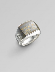 Three-sided, no seam ring with tiger iron design in polished sterling silver. Imported