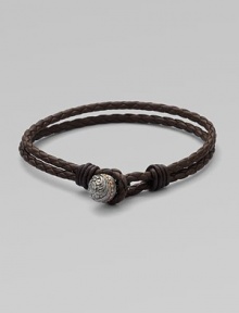 A subtle, yet striking design in woven leather with engraved black rhodium and rose gold bead detail.LeatherSterling silverToggle claspAbout 3½ diam.Imported