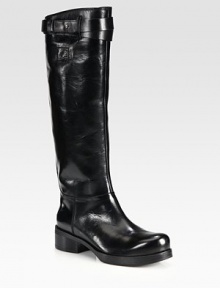 Conquer the day wearing this street-cool leather silhouette, with an easy side zip and stacked heel. Stacked heel, 1½ (40mm)Stacked platform, ¾ (20mm)Compares to a ¾ heel (20mm)Shaft, 16Leg circumference, 14Leather upperSide zip and strap with metal pull-tab closuresLeather lining and solePadded insoleMade in Italy Conquer the day wearing this street-cool leather silhouette, with an easy side zip and stacked heel. Stacked heel, 1½ (40mm)Stacked platform, ¾ (20mm)Compares to a ¾ heel (20mm)Shaft, 16Leg circumference, 14Leather upperSide zip and strap with metal pull-tab closuresLeather lining and solePadded insoleMade in Italy