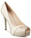 Textured detail and a pretty peep-toe makes the Hershe platform pumps by GUESS an amazing addition to your shoe wardrobe.