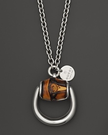 An equestrian-inspired bamboo and sterling silver pendant necklace from Gucci. An equestrian-inspired bamboo and sterling silver pendant necklace from Gucci.