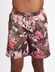 Summery, floral style for the beach and beyond in smooth, quick-drying nylon.Elastic drawstring waistSide slash, back welt pocketsInseam, about 7NylonMachine washImported Summery, floral style for the beach and beyond in smooth, quick-drying nylon.Elastic drawstring waistSide slash, back welt pocketsInseam, about 7NylonMachine washImported