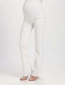 Classic white denim, slim through the legs with a chic, bootcut opening.THE FITExpandable elastic belly panel Mid rise Boot leg Inseam, about 34THE DETAILSFour-pocket style 25% cotton/23% polyester/2% elastane Machine wash Made in USA of imported fabric