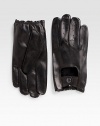 EXCLUSIVELY OURS. Created with heritage inspirations, this signature driving glove is crafted from the finest Italian leather, with perforations and a snap-button detail for a dose of luxury and long-lasting comfort.About 8 longLeatherDry cleanMade in Italy