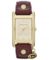 This Taylor collection watch from Michael Kors makes a playful nod to retro luggage design.