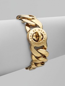 A logo engraved, chain link design. Brass Turnlock closure Length, about 8 Width, about ¾ Imported A logo engraved, chain link design. Brass Turnlock closure Length, about 8 Width, about ¾ Imported