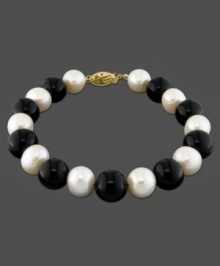 Always on trend. This gorgeous bracelet features cultured freshwater pearl (8-9 mm) and onyx (9 mm) set in 14k gold. Approximate length: 7-1/2 inches. Always on trend. This gorgeous bracelet features cultured freshwater pearl (8-9 mm) and onyx (9 mm) set in 14k gold. Approximate length: 7-1/2 inches.