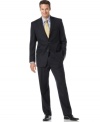 A traditional suit marked by unexpected luxury. Woven in a fine, comfy wool, this two-button suit has a soft feel an handsome drape. Jacket features a notched lapel, chest welt pocket and front flap pockets. Four-button detail at cuff. Center back vent. Double-reverse pleated pant has quarter-top front pockets for a modern touch. Zip fly with extended-tab closure. Back besom pockets. Unfinished hem. Jacket and pant sold together.