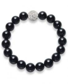 A traditional style with bold, modern appeal. This smooth strand bracelet showcases shiny onyx beads (10 mm) and a sparkling crystal ball at center (12 mm). Bracelet stretches to fit wrist. Approximate length: 7 inches. A traditional style with bold, modern appeal. This smooth strand bracelet showcases shiny onyx beads (10 mm) and a sparkling crystal ball at center (12 mm). Bracelet stretches to fit wrist. Approximate length: 7 inches.