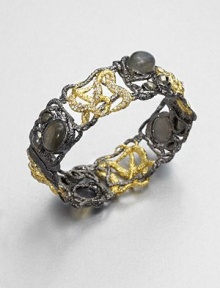 From the Elements Siyabona Collection. Swarovski crystals, pyrite and labradorite embellish this organically shaped ruthenium-plated and goldtone design. Ruthenium-plated and goldtone Swarovski crystalsPyrite and labradoriteDiameter, about 2.5Hinged, magnetic closureMade in USA From the Elements Siyabona Collection. Swarovski crystals, pyrite and labradorite embellish this organically shaped ruthenium-plated and goldtone design. Ruthenium-plated and goldtone Swarovski crystalsPyrite and labradoriteDiameter, about 2.5Hinged, magnetic closureMade in USA