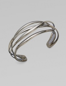 Slender, polished bands have a liquid look as they gracefully crisscross one another in this lovely open cuff.Ruthenium platedDiameter, about 2¼Width, about ¾Imported