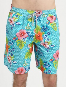 Aqua print swim trunk with drawstring and full elastic waist and rear eyelets to avoid a ballooning effect, crafted in quick-drying nylon.Elastic drawstring waistSide slash, back flap pocketsInseam, about 9PolyamideMachine washImported Aqua print swim trunk with drawstring and full elastic waist and rear eyelets to avoid a ballooning effect, crafted in quick-drying nylon.Elastic drawstring waistSide slash, back flap pocketsInseam, about 9PolyamideMachine washImported