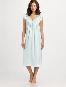 Silky-smooth fabric falls elegantly over the body, with layered flouncy sleeves for a truly romantic design. JewelneckSemi-sheer lace trim at yoke with keyhole neckline and self-tie bowShort layered butterfly sleevesShirring for added drapeAbout 48 from shoulder to hemPolyesterMachine washImported Silky-smooth fabric falls elegantly over the body, with layered flouncy sleeves for a truly romantic design. JewelneckSemi-sheer lace trim at yoke with keyhole neckline and self-tie bowShort layered butterfly sleevesShirring for added drapeAbout 48 from shoulder to hemPolyesterMachine washImported