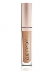 A high-shine, perfectly pigmented lip gloss with rich, long-lasting colour and brilliant shine that creates the appearance of fuller lips. Any skin tone is virtually enhanced by creating a subtle contrast in texture. With the unique blendof moisturizing, anti-aging, anti-oxidant and plumping ingredients provided by the Laura Mercier Lip Complex, the non-sticky gloss formula applies smoothly without feathering or bleeding. A high-shine, perfectly pigmented lip gloss with rich, long-lasting colour and brilliant shine that creates the appearance of fuller lips. Any skin tone is virtually enhanced by creating a subtle contrast in texture. With the unique blendof moisturizing, anti-aging, anti-oxidant and plumping ingredients provided by the Laura Mercier Lip Complex, the non-sticky gloss formula applies smoothly without feathering or bleeding.