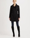 Featuring striking seams, leather tab details and classic ribbed-knit trim, this coat made from an Italian virgin wool blend is a must-wear.Leather tabs on collarConcealed zipper closureBelted silhouettePatch pocketsRibbed-knit trimFully linedAbout 33 from shoulder to hem80% virgin wool/20% nylonDry clean by leather specialistImported of Italian fabric Model shown is 5'11 (180cm) wearing US size 2. 
