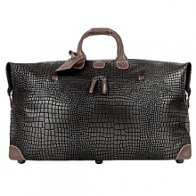 This classically styled crocodile-embossed luggage with leather trim provides the perfect pieces for any stylish traveler on the go. This classically styled crocodile-embossed luggage with leather trim provides the perfect pieces for any stylish traveler on the go.