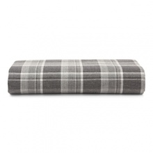 Inspired by the refined polish of menswear, this relaxed collection pairs solid brushed cotton and twill with faux suede trim and plaid. Sheets and pillowcases are in a soft cotton bold plaid in a grey and white palette. Inspired by the refined polish of menswear, this relaxed collection pairs solid brushed cotton and twill with faux suede trim and plaid. Sheets and pillowcases are in a soft cotton bold plaid in a grey and white palette.