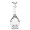 The rich, beveled pattern emphasizes the gleam of the sensuously curved crystal.