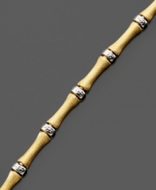 The simple, soothing lines of bamboo are replicated on this beautiful bracelet crafted in 14k gold and sterling silver over sterling silver. Approximate length: 7-1/2 inches.