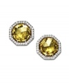 Shape up or ship out. These sparkling stud earrings by Arabella liven any look with round-cut yellow Swarovski zirconias surrounded by octagon-shaped rows of round-cut white Swarovski zirconias (total 9-1/8 ct. t.w.). Set in sterling silver. Approximate diameter: 1/2 inch.
