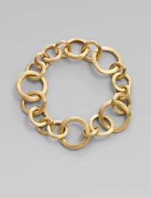 From the Jaipur Links Collection. A modern version of a classic link bracelet, formed of varied circular links of brushed 18k gold.18k yellow gold Length, about 8½ Hidden spring clip clasp Made in Italy