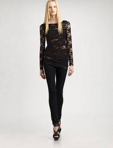 Capture highly coveted style in this sultry lace top with a boatneck and length that hits below the hips. BoatneckLong sleevesLonger length hits below the hipsBody: 90% nylon/10% spandexTrim: 96% rayon/4% spandexDry cleanMade in USA of imported fabricModel shown is 5'9½ (176cm) wearing US size Small. Capture highly coveted style in this sultry lace top with a boatneck and length that hits below the hips. BoatneckLong sleevesLonger length hits below the hipsBody: 90% nylon/10% spandexTrim: 96% rayon/4% spandexDry cleanMade in USA of imported fabricModel shown is 5'9½ (176cm) wearing US size Small.