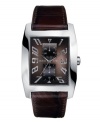 A croc-embossed leather strap lends classic style to this GUESS watch.