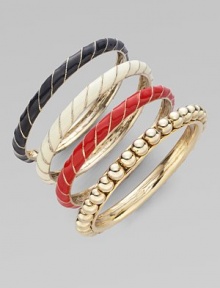 A mix of twisted enamel and polished goldtone metal for a chic stackable set.Enamel Brass Width, about 1¼ Diameter, about 2½ Imported A mix of twisted enamel and polished goldtone metal for a chic stackable set.Enamel Brass Width, about 1¼ Diameter, about 2½ Imported