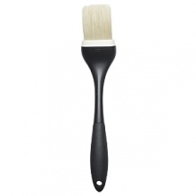Designed with an angled head that's ideal for basting and glazing large roasts and poultry, the GOOD GRIPS Basting Brush from OXO features naturally durable boar bristles for smooth, mess-free application. The brush's angled design keeps your work surface neat and hygienic. Designed with an angled head that's ideal for basting and glazing large roasts and poultry, the GOOD GRIPS Basting Brush from OXO features naturally durable boar bristles for smooth, mess-free application. The brush's angled design keeps your work surface neat and hygienic.