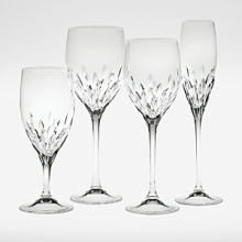 Renowned British fashion designer Jasper Conran introduces a new range of updated formal crystal stemware. In creating each stemware pattern, Mr. Conran brought his signature aesthetic mixing classic British elegance with a cheeky irreverent attitude. The Laurel stemware collection by Jasper Conran features sparkling vertical cuts and will be perfect for your next toast. Renowned British fashion designer Jasper Conran introduces a new range of updated formal crystal stemware. In creating each stemware pattern, Mr. Conran brought his signature aesthetic mixing classic British elegance with a cheeky irreverent attitude. The Laurel stemware collection by Jasper Conran features sparkling vertical cuts and will be perfect for your next toast.