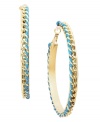 Traditional hoop earrings with a bright pop of color. Bar III's modern style incorporates blue ribbon, a woven pattern, and a gold tone mixed metal setting. Approximate diameter: 2 inches.