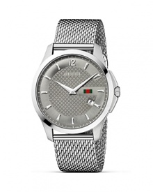 A diamante embossed face on a steel mesh strap lends Gucci's signature look to this versatile, timeless wristwatch. A diamante embossed face on a steel mesh strap lends Gucci's signature look to this versatile, timeless wristwatch.