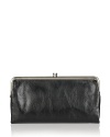 Sleek and shiny, this Hobo leather wallet is a chic home for your cash.