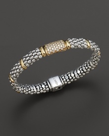 Caviar rope bracelet with gold bar stations and central diamond pavé station. Designed by Lagos. Caviar rope bracelet with gold bar stations and central diamond pavé station. Designed by Lagos.