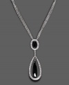 A fearless accessory with ultimate elegance, by Monet. This beautiful necklace features faceted glass stones accented with pave crystals. Approximate length: 16-18 inches. Approximate drop: 2-1/4 inches.