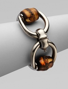 From the Bamboo Silver Collection. A stand-out piece with a sterling silver horsebit motif with a shiny, aged palladium finish and bamboo accents. Palladium-finished sterling silverBambooHinged clasp closureLength, about 6¼Made in Italy From the Bamboo Silver Collection. A stand-out piece with a sterling silver horsebit motif with a shiny, aged palladium finish and bamboo accents. Palladium-finished sterling silverBambooHinged clasp closureLength, about 6¼Made in Italy