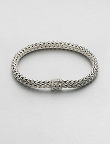 Sterling silver medium oval chain bracelet. Sterling silverSpring claspAbout 3 diam.Imported Sterling silver medium oval chain bracelet. Sterling silverSpring claspAbout 3 diam.Imported