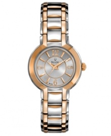 Accents of rose-gold lend playful sophistication to the classic styling of this steel Bulova watch.