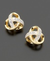 Diamond accents add glitzy sparkle to a traditional knot design. Set in 14k gold.