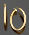 Add happiness to your look with these gorgeous hoop earrings crafted in 14k gold. Approximate diameter: 1 inch.