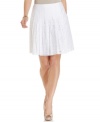 A spring must-have, this T Tahari skirt features allover eyelet lace for both a pretty yet polished look!