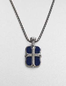 An original design pairs two sterling silver pendants on a single strand. The cross pendant is crafted with pavé diamond detail, and the larger features smooth lapis inlay. Sterling silver Pavé diamonds Lapis Pendant: 1 long Necklace: 24 long Lobster clasp closure Imported 