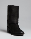 These Eileen Fisher boots are as comfy as her sweaters, with stylish, pullover cuffs that make these timeless basics truly distinctive.