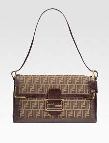Logo fabric with textured leather trim can be carried crossbody or on the shoulder.Adjustable strap, 7-24 drop Magnetic snap closure on flap One inside zip pocket Fully lined 16W X 11H X 3D Made in Italy Logo fabric with textured leather trim can be carried crossbody or on the shoulder.Adjustable strap, 7-24 drop Magnetic snap closure on flap One inside zip pocket Fully lined 16W X 11H X 3D Made in Italy