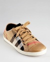 Burberry house-check sneakers are comfortable-chic with leather-trimmed canvas and heritage style.