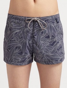 The ultimate tropical style for the beach and beyond in smooth, quick-dry nylon. Elastic drawstring waist Side slash, back zip pockets Mesh lining Inseam, about 4 Nylon Machine wash Imported The ultimate tropical style for the beach and beyond in smooth, quick-dry nylon. Elastic drawstring waist Side slash, back zip pockets Mesh lining Inseam, about 4 Nylon Machine wash Imported