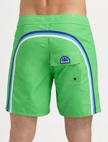 Comfortable, quick dry trunks have a lace-up waist and signature rainbow detail across the back and down the leg.Drawstring waistGrip-tape flyBack flap pocket with grip-tape closureInseam, about 7NylonMachine washImported Comfortable, quick dry trunks have a lace-up waist and signature rainbow detail across the back and down the leg.Drawstring waistGrip-tape flyBack flap pocket with grip-tape closureInseam, about 7NylonMachine washImported